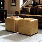 A pair of small ottomans compete a living room
